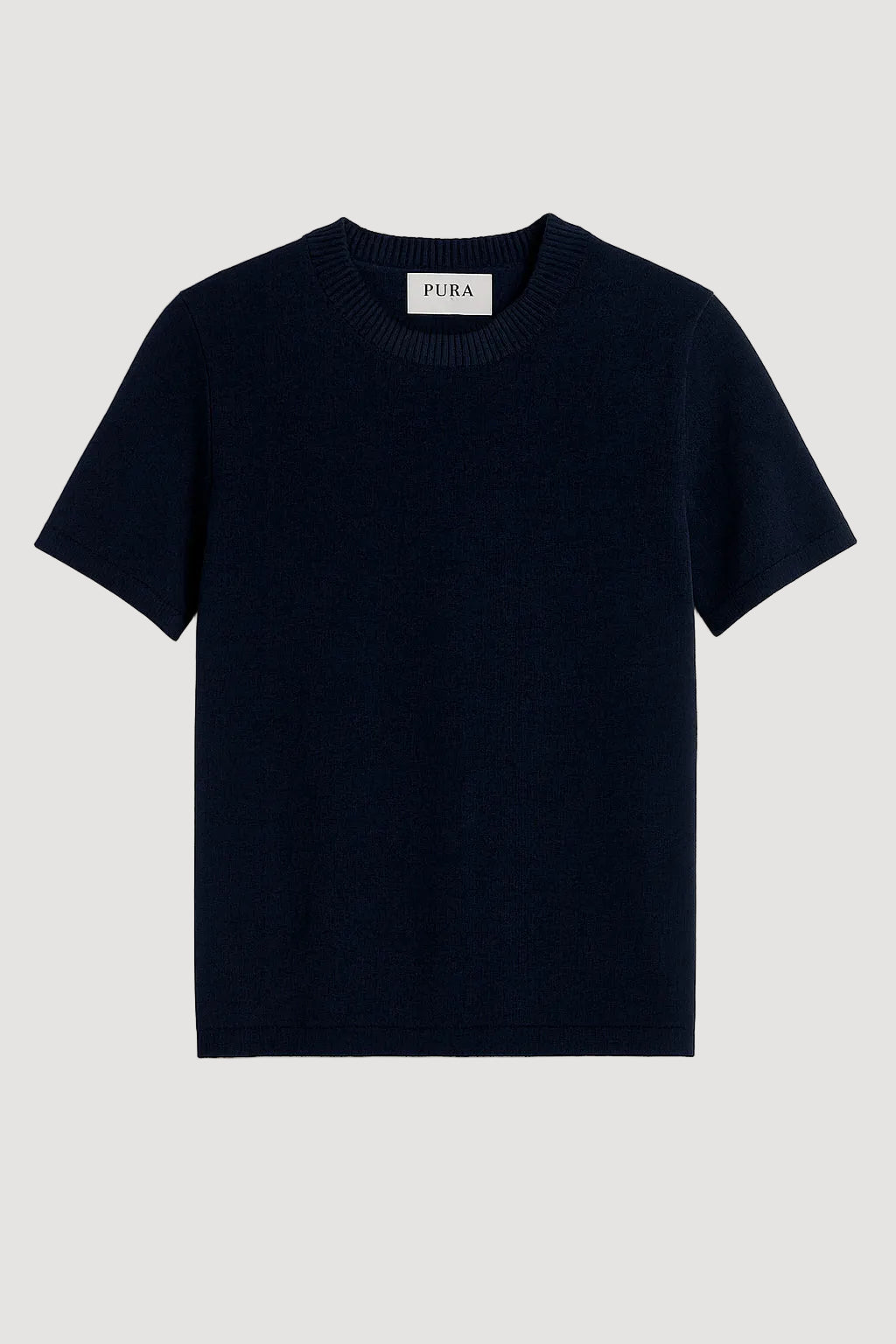 navy t-shirt with 'Pura' label on a white background