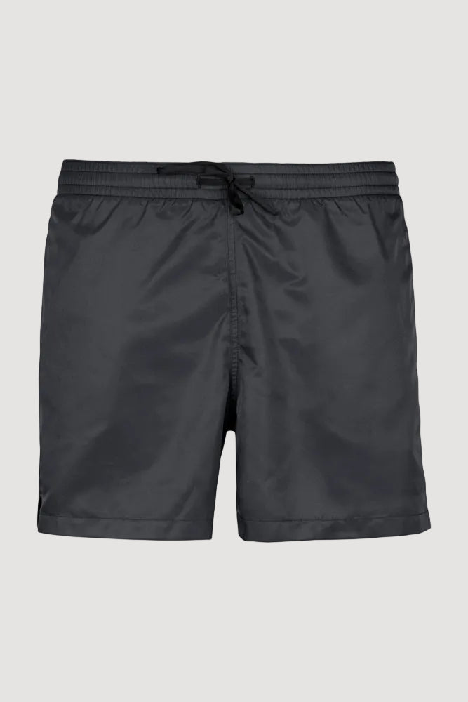 A pair of black swim shorts with a drawstring waistband, depicted in a flat lay format.
