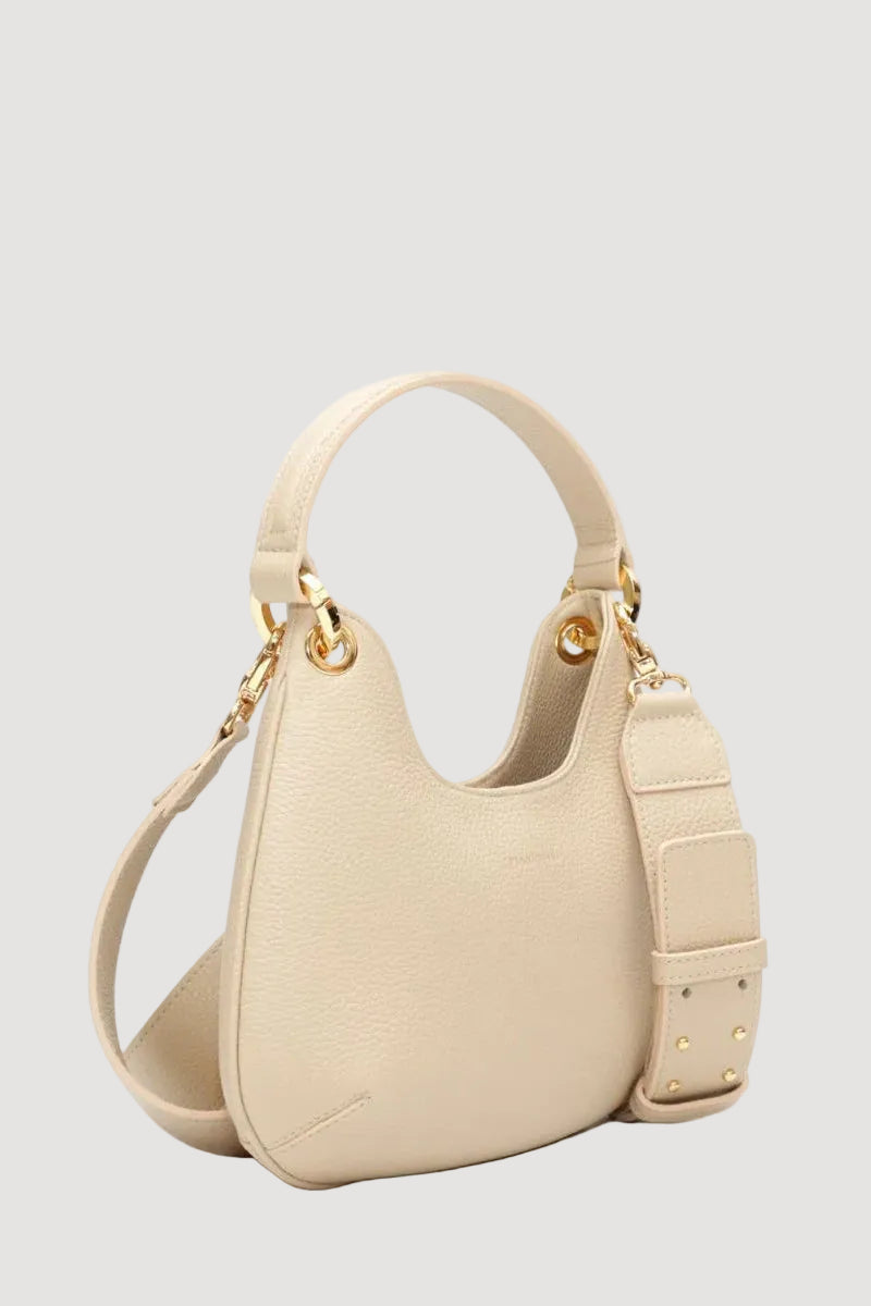 Beige handbag with gold accents on a white background