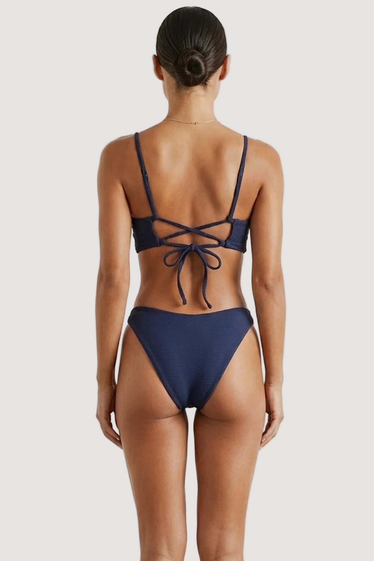 PURA Ethical sustainable paloma swimsuit waffle recycled fabric navy blue back