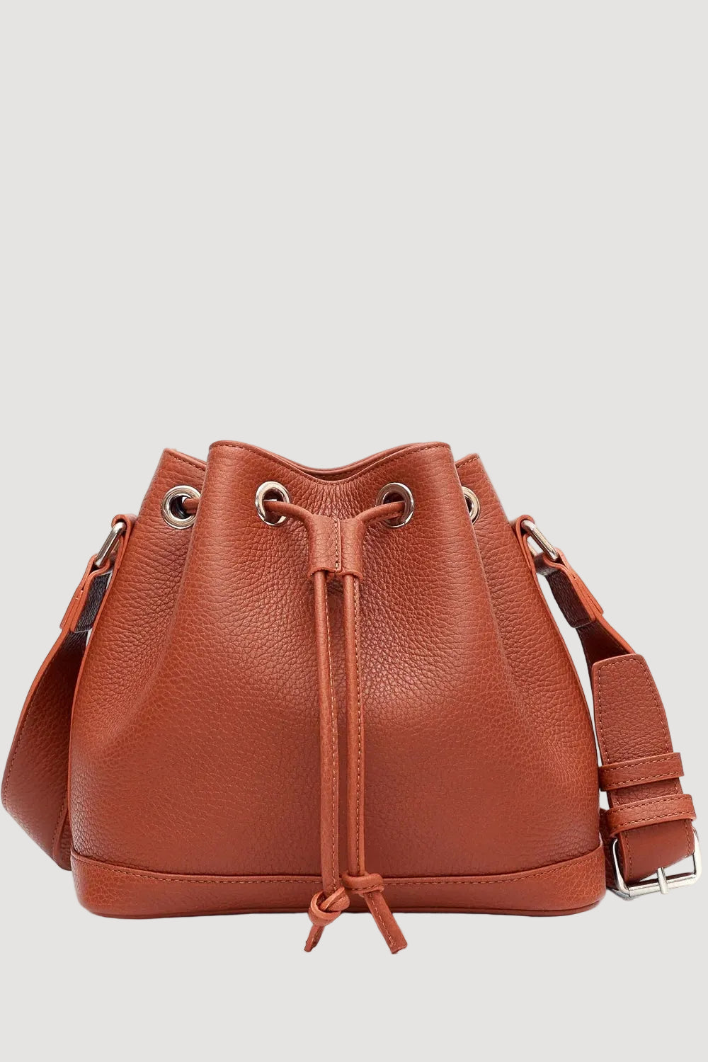 Brown leather bucket bag on a white background