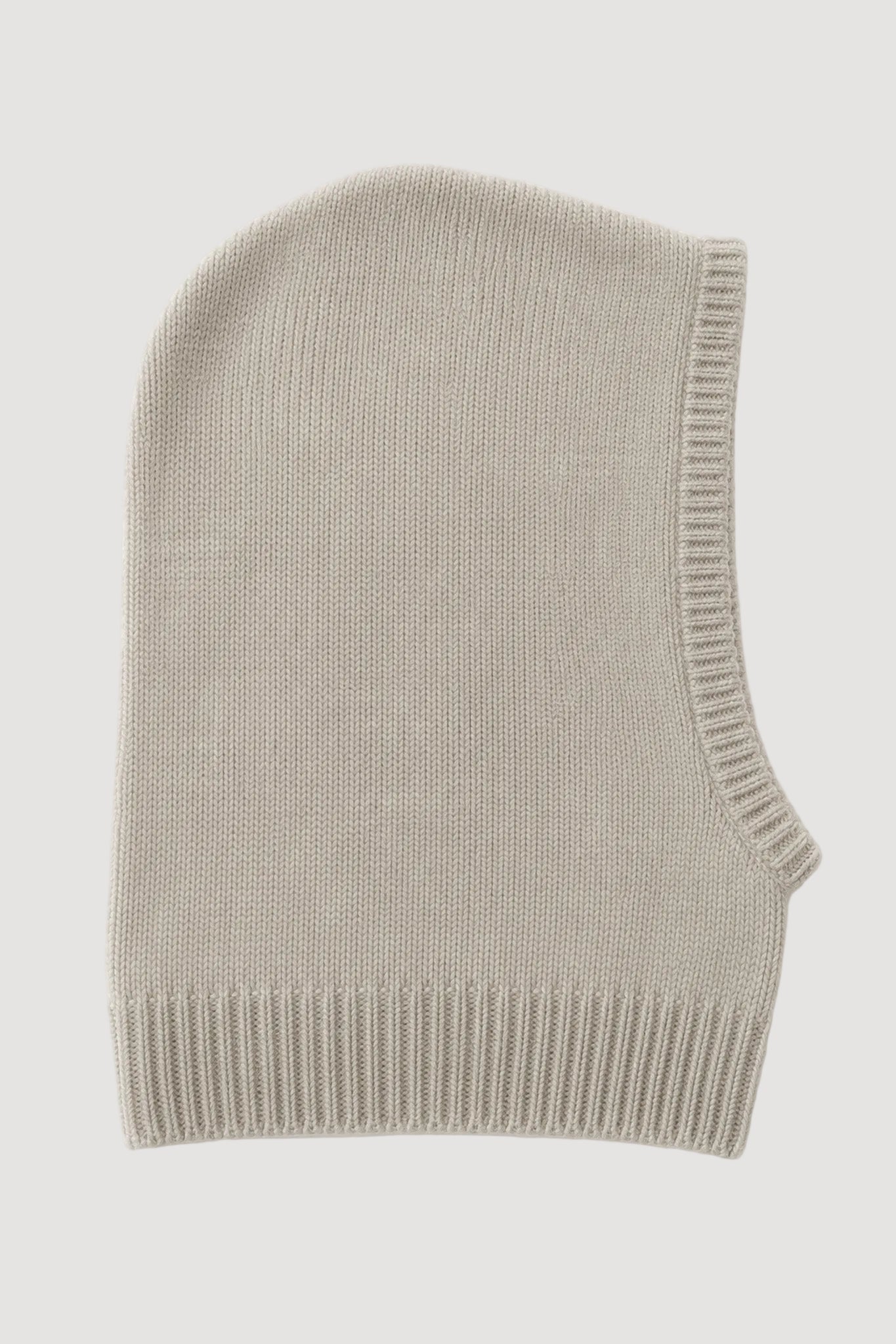 A light beige knit balaclava or neck warmer with ribbed trim, shown flat against a white background.
