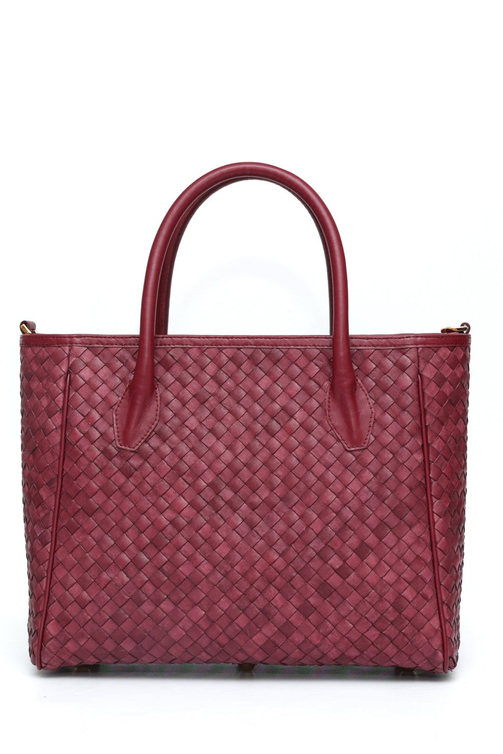 Red woven handbag on a white background