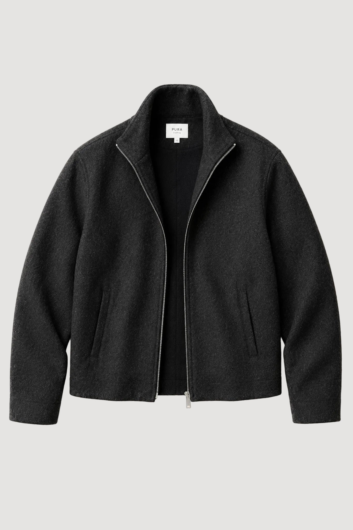 A dark charcoal gray zip-up jacket with a high stand collar, laid flat against a light beige background.