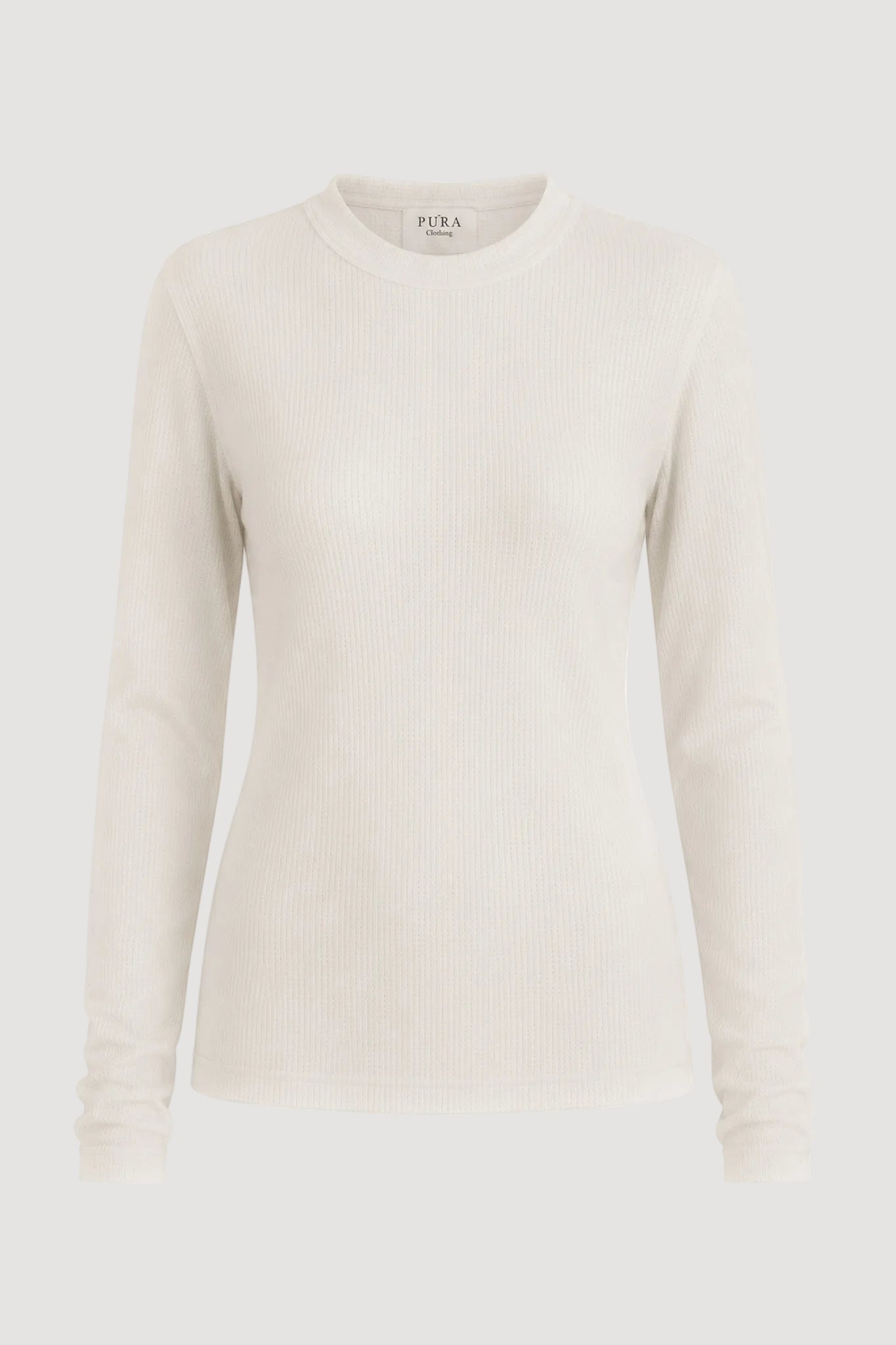 An off-white ribbed long-sleeve crewneck top by PURA, shown on a plain white background.
