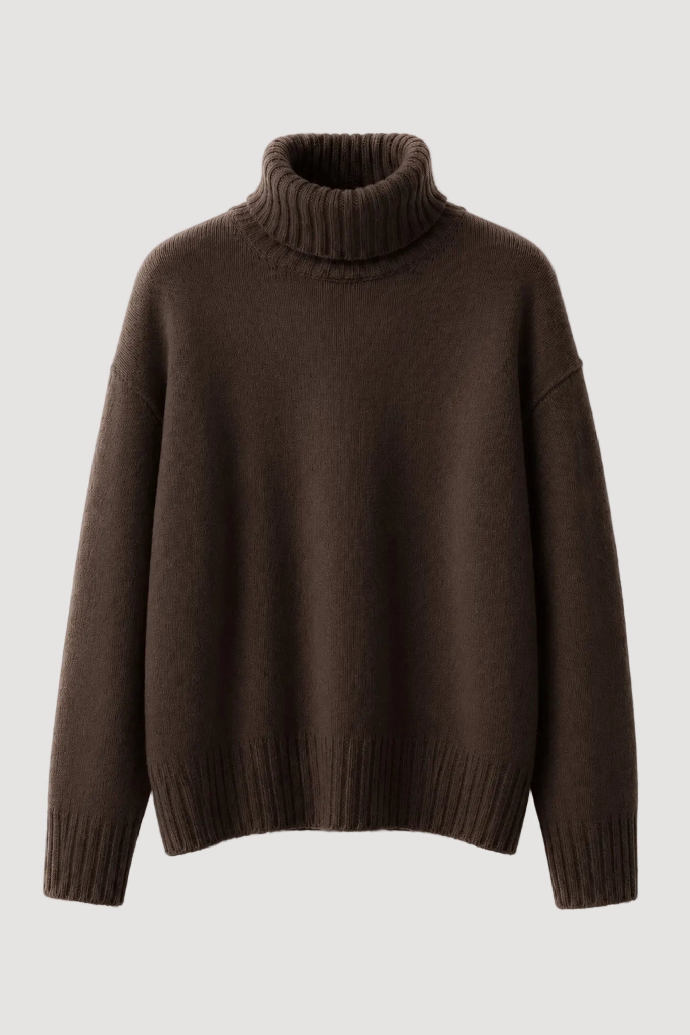 A dark brown knit turtleneck sweater with a ribbed collar, cuffs, and hem, displayed against a clean white background.